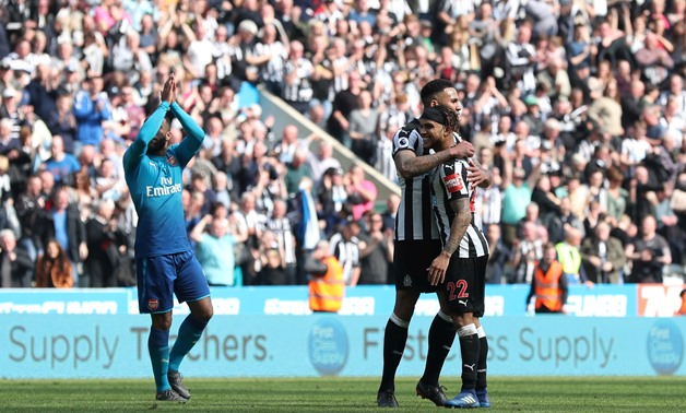 
Soccer Football - Premier League - Newcastle United vs Arsenal - St James' Park, Newcastle, Britain - April 15, 2018 Newcastle United's DeAndre Yedlin and Jamaal Lascelles celebrate after the match REUTERS/Scott Heppell