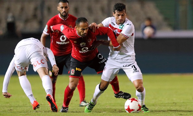 Soccer Football - Egyptian Premier League - Zamalek vs Al Ahly - Cairo International Stadium, Cairo, Egypt - January 8, 2018 Al Ahly's Walid Soliman in action with Zamalek's Tarek Hamed REUTERS 