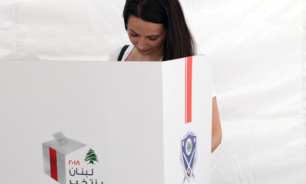 A Lebanese expat casts her vote at the Lebanese Consulate in Dubai, United Arab Emirates April, 27, 2018. REUTERS/Satish Kumar