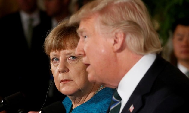 The first face-to-face meeting between President Trump and German Chancellor Angela Merkel started awkwardly and ended even more oddly, with a quip by Trump about wiretapping that left the German leader visibly bewildered. REUTERS/Jonathan Ernst
