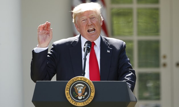 U.S. President Donald Trump announces his decision to withdraw from the Paris climate agreement at the White House in Washington on June 1. (CNS photo/Kevin Lamarque, Reuters)
