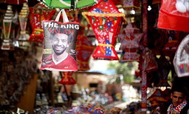 A plastic shopping bag bearing the image of Liverpool's Egyptian forward soccer player Mohamed Salah, is seen at a market in Cairo - Reuters