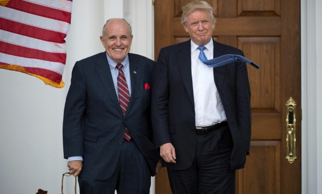 Donald Trump a rencontré le possible prétendant, Rudy Giuliani, le 20 novembre 2016 dans le New Jersey Don EMMERT (AFP/Archives)
