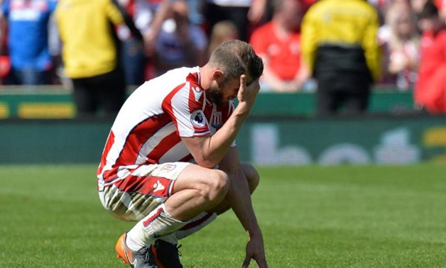 Soccer Football - Premier League - Stoke City vs Crystal Palace - bet365 Stadium, Stoke-on-Trent, Britain - May 5, 2018 Stoke City's Erik Pieters looks dejected after the match as they are relegated from the Premier League REUTERS/Peter Powell

