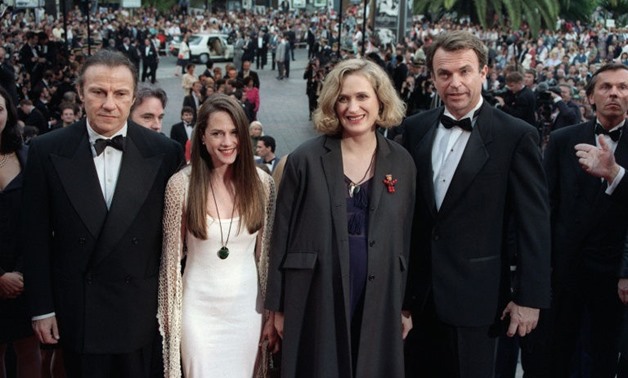 New Zealand film director Jane Campion (2nd R) accompanied by (from L), Harvey Keitel, Holly Hunter, and Sam Neill, arrives, for the screening of her film "The Piano" at the 1993 Cannes festival.