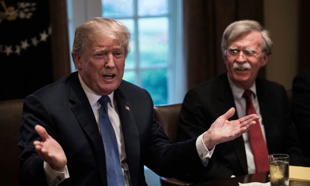 US President Donald Trump met late Monday with senior military leaders and his national security team -- including new National Security Advisor John Bolton (R) -- at the White House - AFP/Nicholas Kamm