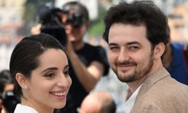 “Yomeddine” Egyptian-Austrian director Abu Bakr Shawky along with the movie producer Dina Emam at 71 st Cannes Film Festival - Egypt Today.
