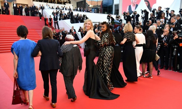 Australian actress Cate Blanchett and others walk the red carpet in protest
