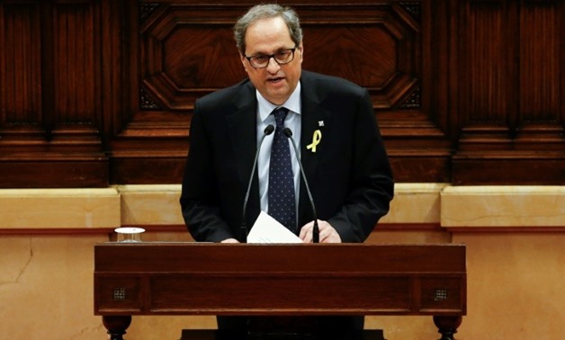 Independence advocate Quim Torra gives a speech at the Catalan's parliament as he stands for regional president
