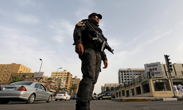 Police guard in a Cairo street - FILE 