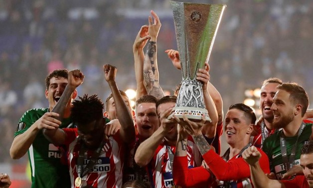 Soccer Football - Europa League Final - Olympique de Marseille vs Atletico Madrid - Groupama Stadium, Lyon, France - May 16, 2018 Atletico Madrid players celebrate with the trophy after winning the Europa League REUTERS/Vincent Kessler

