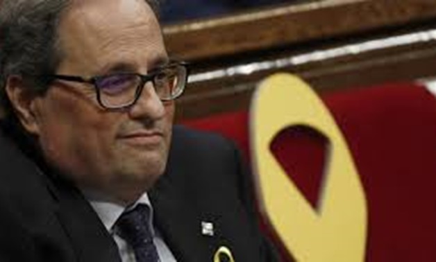 Quim Torra promised to restore Catalonia's laws suspended by Spanish courts [Juan Medina/Reuters

