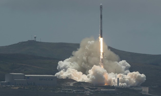 The SpaceX Falcon 9 rocket carrying the GRACE twin satellites and five Iridium commercial communication satellites as seen in this NASA photo lifting off from the Vandenberg Air Force Base in California
