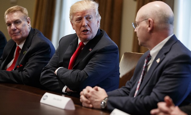 President Donald Trump speaks during a meeting with steel and aluminum executives in the Cabinet Room
