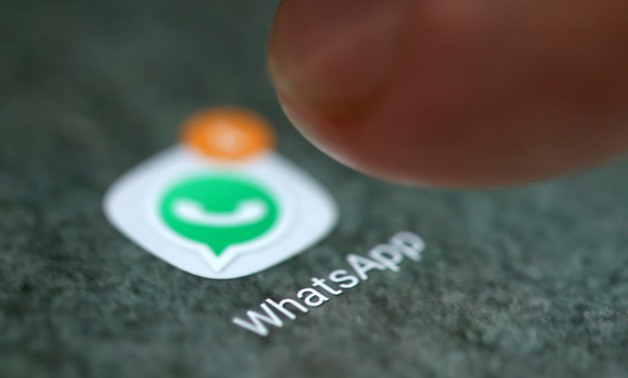 The WhatsApp app logo is seen on a smartphone in this picture illustration taken September 15, 2017. REUTERS/Dado Ruvic/Illustration/File Photo