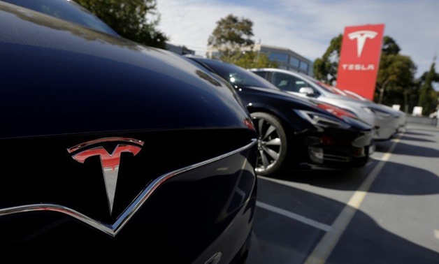 Tesla agrees to settle class action over Autopilot billed as 'safer' - Reuters