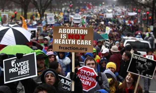 Anti-abortion demonstrators take part in the "March for Life" in Washington January 23, 2012. REUTERS/Kevin Lamarque
