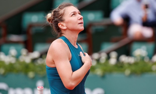 Tennis - French Open - Roland Garros, Paris, France - May 30, 2018 Romania's Simona Halep celebrates winning her first round match against Alison Riske of the U.S. REUTERS/Pascal Rossignol
