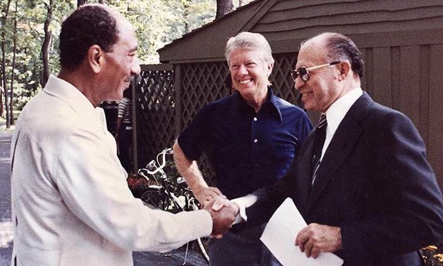 Israeli Prime Minister Menachem Begin and Egyptian President Anwar Sadat with U.S. President Jimmy Carter at Camp David in September 1978 - Wikimedia/U.S. Government Archives