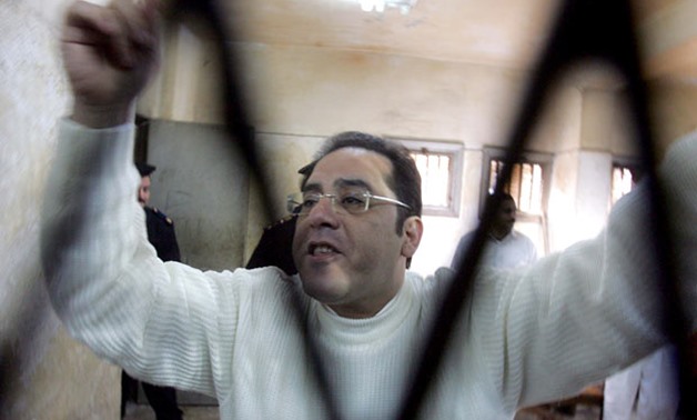 FILE- Ayman Nour reacts after being sentenced to five years in prison on December 24, 2005- AFP