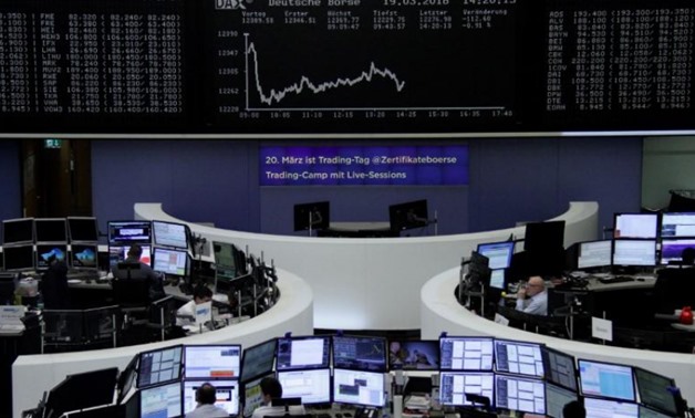 FILE PHOTO: The German share price index, DAX board, is seen at the stock exchange in Frankfurt, Germany, March 19, 2018. REUTERS/Staff/Remote
