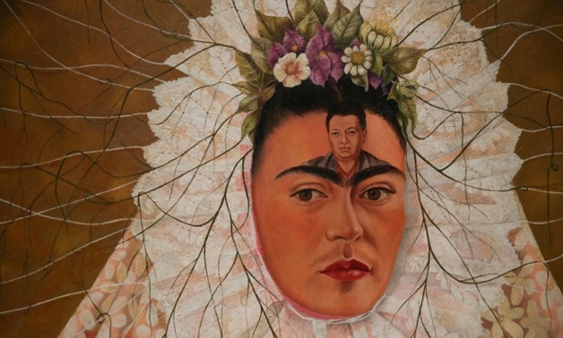 The Frida Kahlo exhibition in London includes this 1943 painting entitled "Self-portrait as a Tehuana"-AFP / Daniel LEAL-OLIVAS

