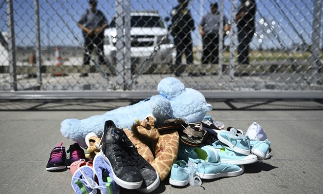 Shoes left by the Tornillo border port near El Paso, Texas, during a protest rally against the separation of migrant families
