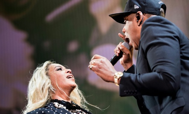 Beyonce (L) and Jay-Z -- seen here at a 2016 event -- were held out of the top of the US album chart by Aussie pop band 5 Seconds of Summer.
