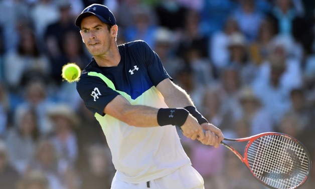 Andy Murray is still unsure if he will be able to make it through Wimbledon
AFP / Glyn KIRK

