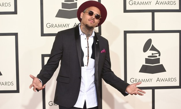 Chris Brown in 2009 was convicted of beating fellow singer Rihanna, who was then his girlfriend and was forced to miss the Grammy Awards due to her injuries - AFP