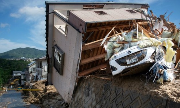 A damaged house in a flood hit area in Kumano, Hiroshima prefecture, Japan, on July 9, 2018. - Martin Bureau / AFP | 

