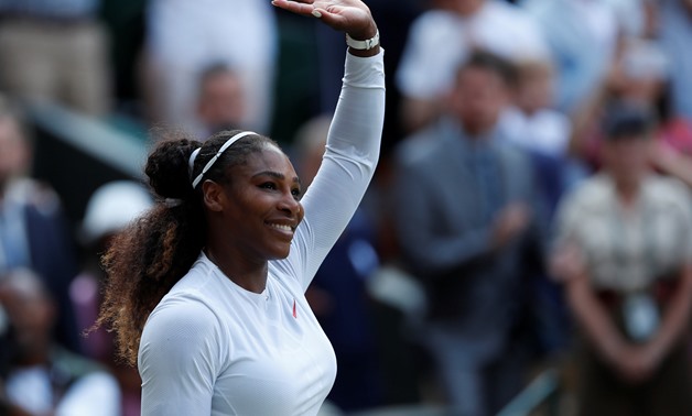 Tennis - Wimbledon - All England Lawn Tennis and Croquet Club, London, Britain - July 14, 2018 Serena Williams of the U.S. waves after losing the women's singles final against Germany's Angelique Kerber REUTERS/Andrew Boyers
