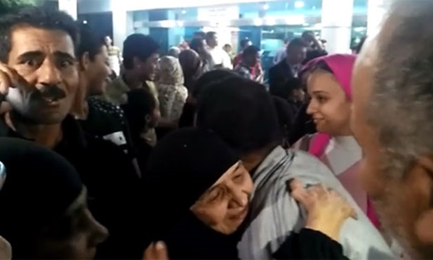 Egyptian elderly woman, Saadeya, who was detained for four months by Saudi authorities over drugs smuggling charges arrives at Cairo International Airport on July 18, 2018 - Press photo/Egypt Today