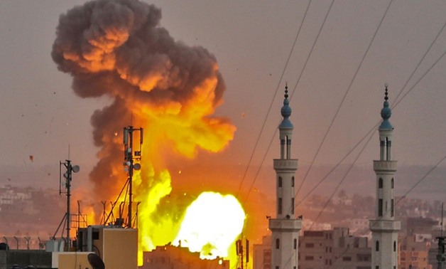 A picture taken on July 20, 2018 shows a fireball exploding in Gaza City during Israeli bombardment
