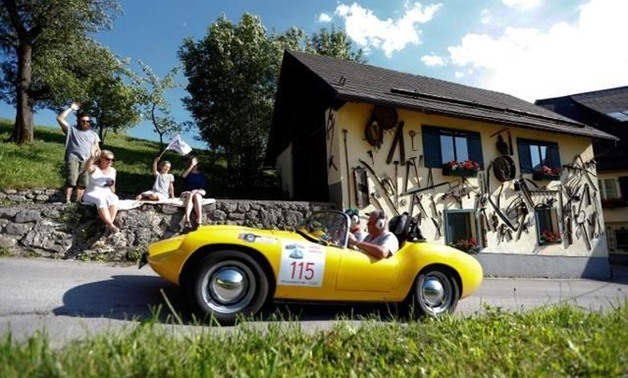 Participants drive their car during the Ennstal Classic car rally in the village of Puergg, Austria July 19, 2018. Picture taken July 19, 2018. REUTERS/Leonhard Foeger

