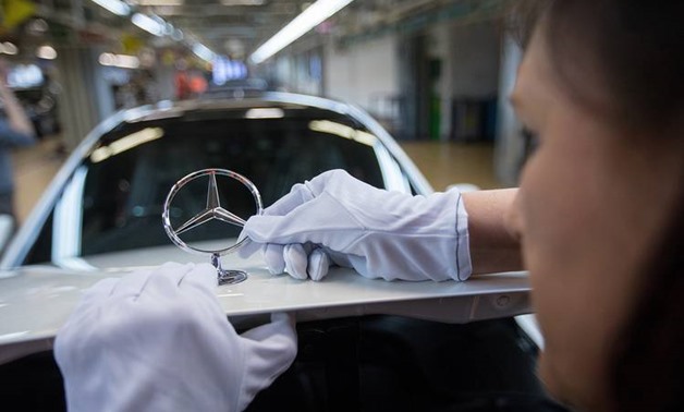 German industry warns US auto tariffs not completely off table yet - AFP