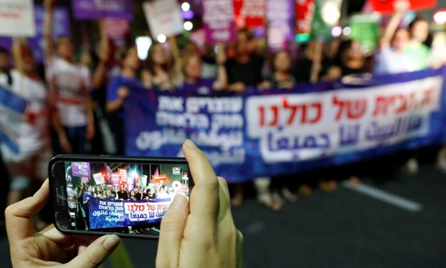 Protesters in Tel Aviv rally against the controversial legislation on July 14, 2018, before the bill was passed by lawmakers
