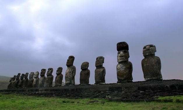 In this file photo taken on August 11, 2013 Moais -- stone statues of the Rapa Nui culture -- are seen on the Ahu Tongariki site on Easter Island, 3700 km off the Chilean coast in the Pacific Ocean. AFP / GREGORY BOISSY