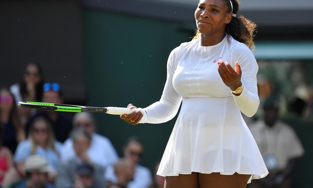 FILE PHOTO: Serena Williams in action at Wimbledon, London, Britain - July 14, 2018. REUTERS/Toby Melville/File Photo
