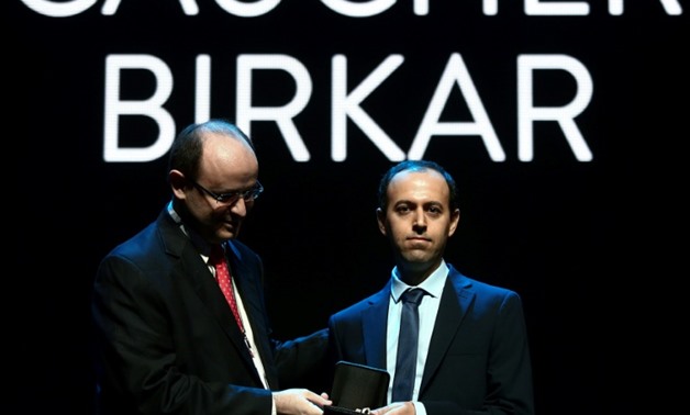 Kurdish mathematician, Cauchar Birkar (R), 40, receiving the Fields Medals Award, math's most prestigious prize, at the International Mathematics Convention (ICM 2018) in Rio de Janeiro, Brazil
