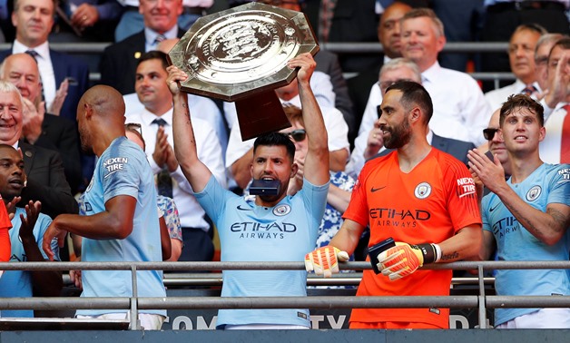 Soccer Football - FA Community Shield - Manchester City v Chelsea - Wembley Stadium, London, Britain - August 5, 2018 Manchester CityÕs Sergio Aguero celebrates winning the community shield with the trophy Action Images via Reuters/John Sibley

