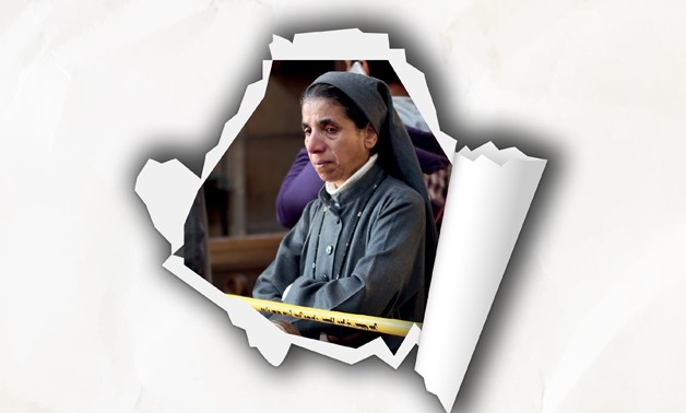 A Coptic nun reacts after Palm Sunday bombing- Egypt Today