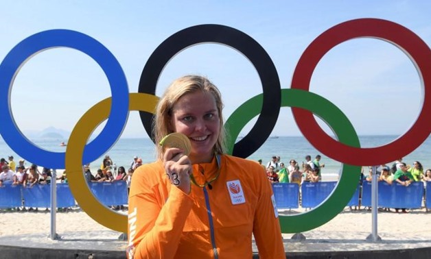 2016 Rio Olympics - Marathon Swimming - Final - Women's 10km Marathon Swimming - Victory Ceremony - Fort Copacabana - Rio de Janeiro, Brazil - 15/08/2016. Sharon van Rouwendaal (NED) of the Netherlands poses with her gold medal. REUTERS/Toby Melville
