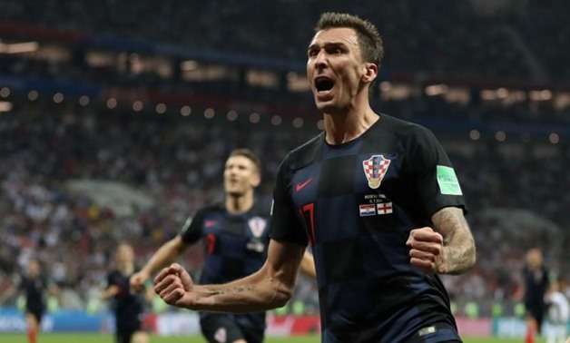 Croatia's Mario Mandzukic celebrates scoring their second goal. REUTERS/Carl Recine 

