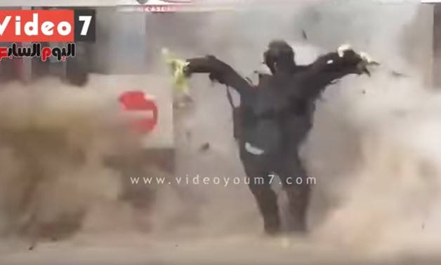 The moment an IED detonated while Captain Diya Fotouh was attempting to dismantle it outside Talbiya police station in Giza in January 2015 - Youtube still image