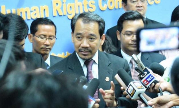 Keo Remy, head of the government's Cambodian Human Rights Committee, speaks to the press at an event earlier this year. Facebook
