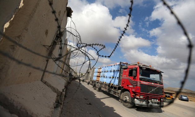 Israel lets food, commercial goods back into Gaza Egypt seeks truce - Reuters