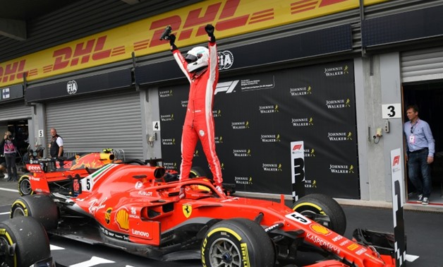 Sebastian Vettel cut Lewis Hamilton's championship lead with victory in Belgium - AFP / EMMANUEL DUNAND
