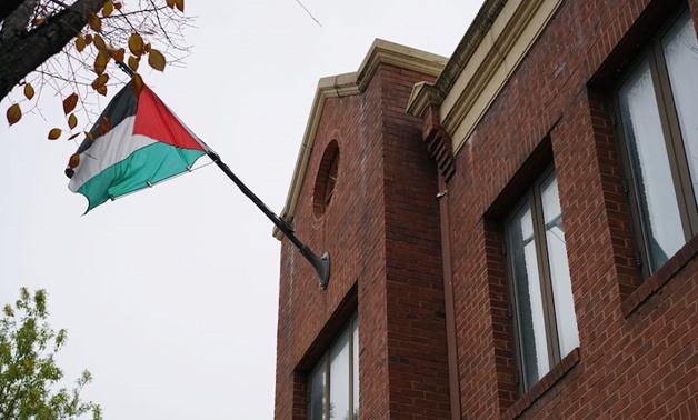 The Palestinian flag is seen above the offices of the Palestine Liberation Organization in Washington, DC, November 18, 2017. (Mandel Ngan/AFP/Getty Images via JTA)