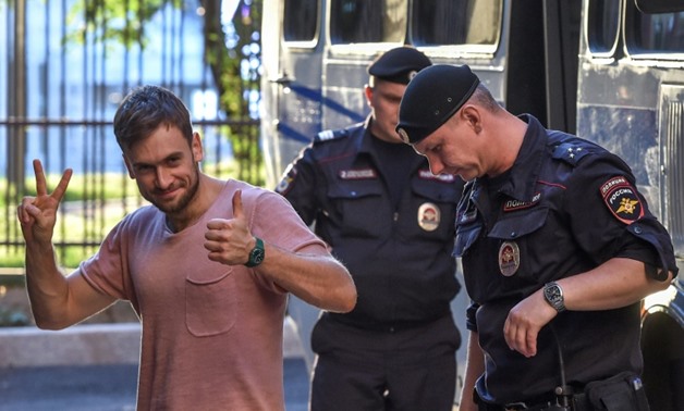 Pussy Riot activist Pyotr Verzilov, shown here during a July court appearance, has been hospitalised, with his girlfriend saying she was "not ruling out... outside interference"
